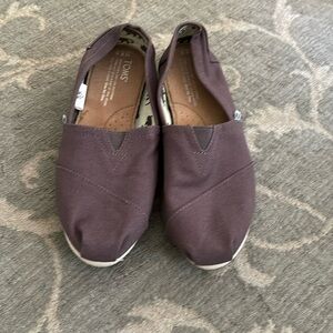 Gently used Toms brand grey slip ons. very comfy!
